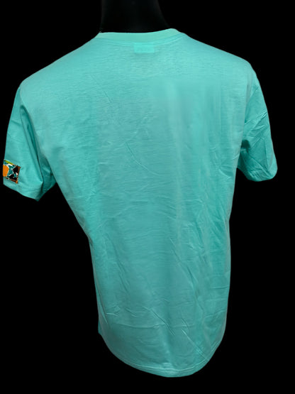 green t-shirt with three patched print