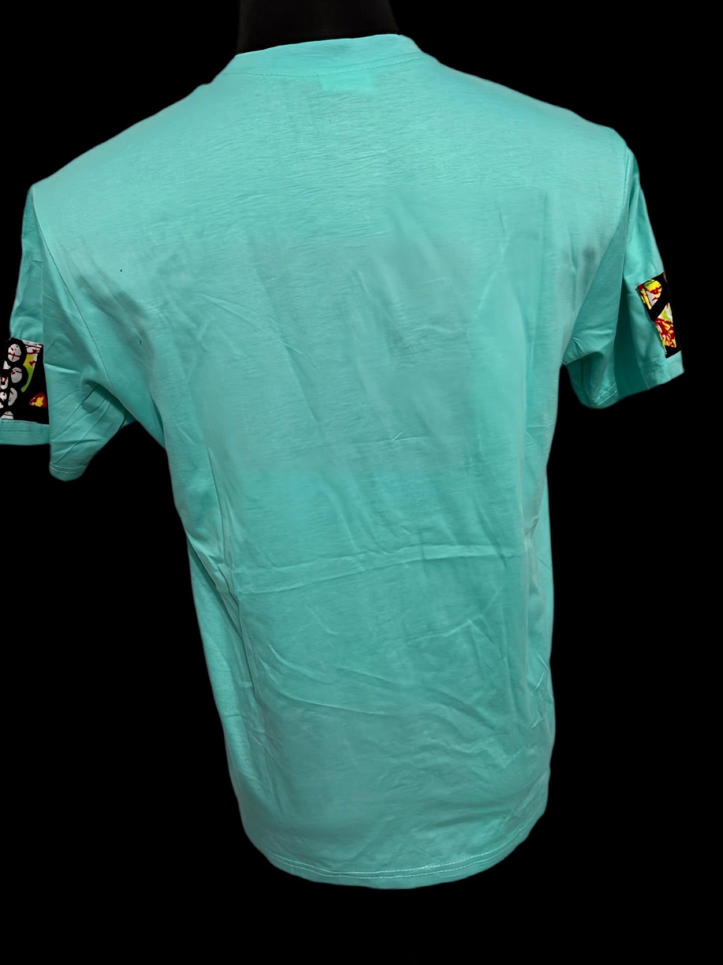 green t-shirt with wax-like diamond print