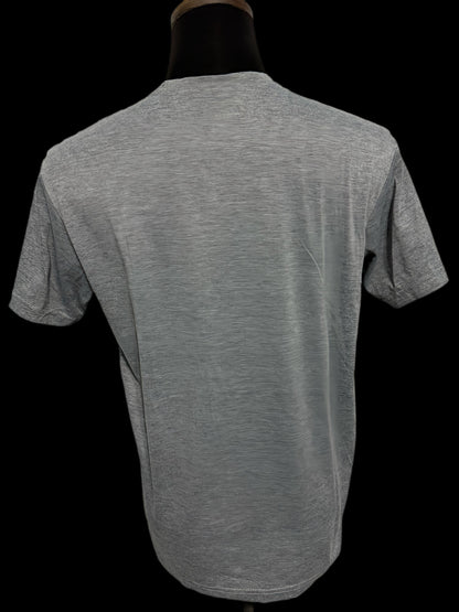 grey t-shirt with cowries and shapes