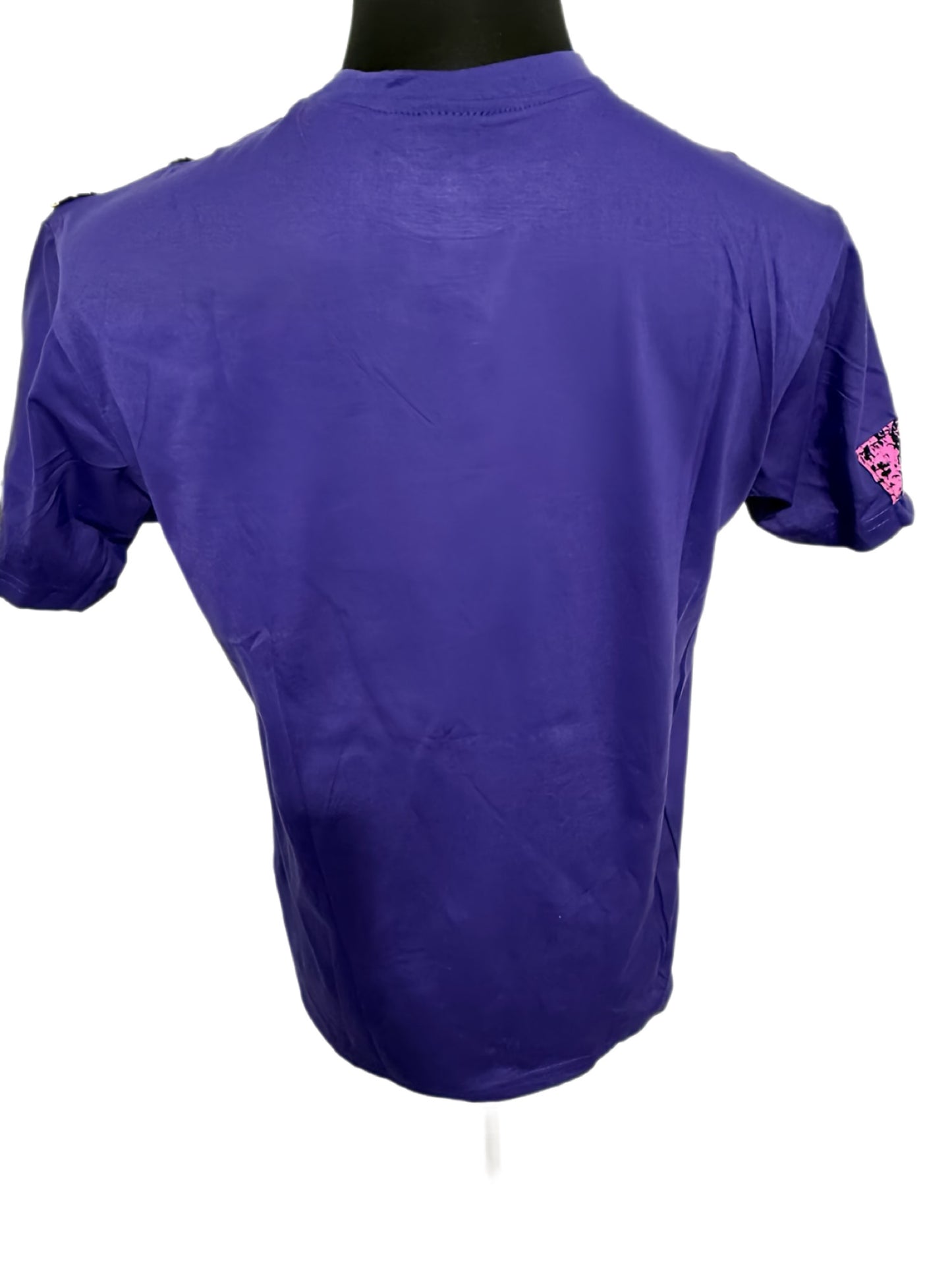 purple t-shirt with multi-color african symbols